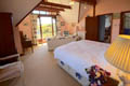 view of the East bedroom at Gardeners Rest towards the balcony